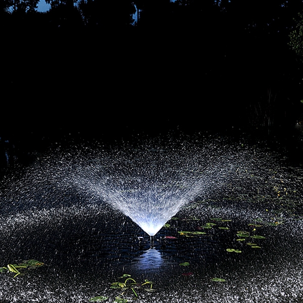 Pond Boss 1/2 HP Floating Fountain - Trumpet Fountain Nozzle at Night